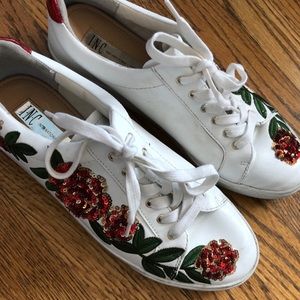 white shoes with embroidered bedazzled roses